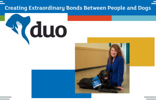 Duo Dogs CEO Dawn van Houten posing with an Assistance Dog in Training
